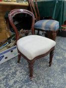 A CHILD'S MAHOGANY BALLOON BACKED CHAIR