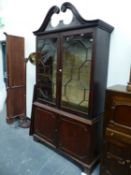 AN 18th C. MAHOGANY DISPLAY CABINET, THE SWAN NECK TOP ABOVE ASTRAGAL GLAZED AND PANELLED DOORS ON