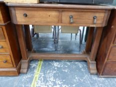AN ARTS AND CRAFTS OAK TWO DRAWER TABLE