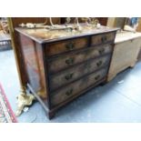 AN 18th C. WALNUT CHEST OF TWO SHORT AND THREE GRADED LONG DRAWERS ON BRACKET FEET