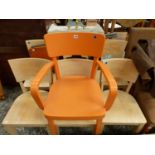 A SET OF SIX BLOND WOOD CHAIRS, A FOLDING PROJECTION TABLE AND AN ORANGE PAINTED ELBOW CHAIR