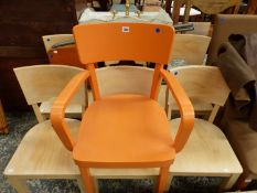 A SET OF SIX BLOND WOOD CHAIRS, A FOLDING PROJECTION TABLE AND AN ORANGE PAINTED ELBOW CHAIR