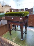 AN EDWARDIAN STAINED WOOD AND GREEN VELVET PIANO STOOL