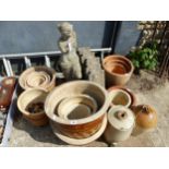 A QUANTITY OF GARDEN POTS, LAWN EDGINGS, TWO STONE JARS AND A CONCRETE FIGURE