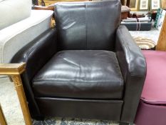 A BLACK LEATHER UPHOLSTERED ARMCHAIR