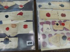 AN INTERESTING ALBUM CONTAINING 19th CENTURY WAX SEALS, SEVEN PENNY RED STAMPS, AN EARLY LETTER ETC.