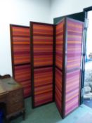 A MAHOGANY FRAMED 6-FOLD SCREEN, EACH FOLD WITH TWO RED AND OCHRE HORIZONTALLY STRIPED TEXTILE