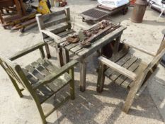 A TEAK GARDEN TABLE AND THREE CHAIRS