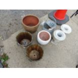 A SMALL PAIR OF CLASSICAL STYLE URNS, FOUR PLANTERS AND A GALVANISED MOP BUCKET