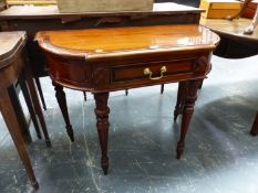 A ROSEWOOD CROSS BANDED MAHOGANY SINGLE DRAWER TABLE ON CARVED AND FLUTED TAPERING CYLINDRICAL LEGS