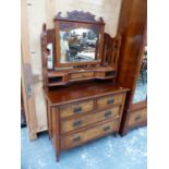 A MIRROR BACKED MAHOGANY DRESSING TABLE, THE TWO SHORT AND TWO LONG DRAWERS WITH BURR WALNUT FRONTS