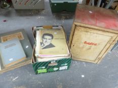 A PAINTED METAL CAKE CABINET TOGETHER WITH SHEET MUSIC