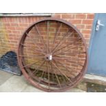 A PAIR OF CAST IRON CART WHEELS