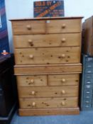 A PAIR OF PINE CHESTS OF TWO SHORT AND TWO LONG DRAWERS, EACH. W 96 x D 43 x H 74cms.