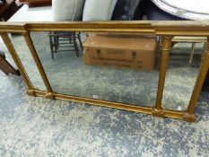 A TRIPLE PLATE MIRROR IN GILT ARCHITECTURAL FRAME