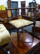 A MAHOGANY BOBBIN TURNED CORNER CHAIR WITH UPHOLSTERED SEAT