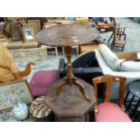 A VINE CARVED FRUIT WOOD TRIPOD TABLE TOGETHER WITH A CHIP CARVED TWO TIER OCTAGONAL TABLE