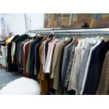 A LARGE COLLECTION OF VINTAGE AND MODERN LADIES AND GENTS CLOTHING TO INCLUDE BURBERRYS, AQUASCUTEN,