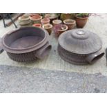 A PAIR OF UNUSUAL ANTIQUE CAST IRON VENTILATION CYLINDERS