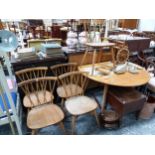 AN ERCOL DROP FLAP OVAL TABLE TOGETHER WITH FIVE CHAIRS