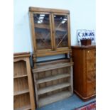 A 1940'S GLAZED OAK DISPLAY CABINET TOGETHER WITH A PINED CABINET OF THREE SHELVES NOW OPEN FRONTED