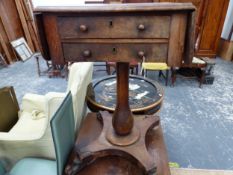 A MAHOGANY FLAP TOP TWO DRAWER TABLE ON BALUSTER COLUMN AND FOUR SCROLL FEET