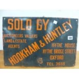 A VINTAGE HOOKHAM & HUNTLEY ENAMELLED SIGN.