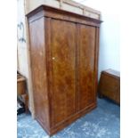 A FRENCH FRUITWOOD VENEERED PINE ARMOIRE