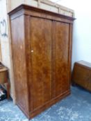 A FRENCH FRUITWOOD VENEERED PINE ARMOIRE