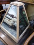 AN OAK FRAME SHOE SHOP MIRROR.