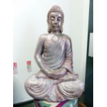A SILVERED FIGURE OF THE BUDDHA SERENELY SEATED