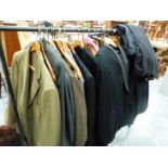 A QUANTITY OF VINTAGE GENTLEMANS SUITS AND JACKETS INC. BURBERRY, HECTOR POWE, RAIL NOT INCLUDED.