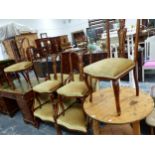 AN EDWARDIAN SUITE OF FOUR MARQUETRIED SIDE CHAIRS AND TWO ARMCHAIRS UPHOLSTERED IN BEIGE VELVET