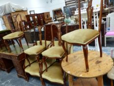 AN EDWARDIAN SUITE OF FOUR MARQUETRIED SIDE CHAIRS AND TWO ARMCHAIRS UPHOLSTERED IN BEIGE VELVET