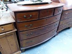 A CROSS BANDED AND LINE INLAID MAHOGANY BOW FRONT CHEST OF THREE SHORT AND THREE LONG DRAWERS