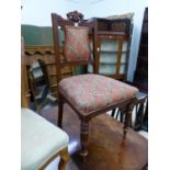 A VICTORIAN MAHOGANY CHAIR, THE BACK AND SEAT UPHOLSTERED IN FLORAL DIAMOND DIAPER ON A TERRACOTTA