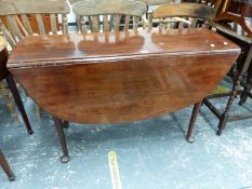 A MAHOGANY OVAL DROP FLAP DINING TABLE ON TAPERING CYLINDRICAL LEGS WITH PAD FEET