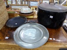 A LARGE PEWTER CHARGER, A COOKING POT AND A FRYING PAN.