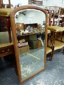 A MAHOGANY FRAMED BEVELLED GLASS MIRROR. 133 x 68cms.