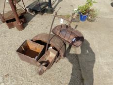 A WHITE LINE MACHINE TOGETHER WITH THREE CAST IRON TROUGHS