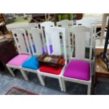 A SET OF EIGHT GREY AND WHITE PAINTED CHAIRS WITH COLOURFUL DROP IN SEATS