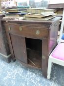 AN OAK WRITING CABINET WITH LIFT UP SHELVED TOP, THE TWO FLAPS BELOW OPENING OUT TO EACH SIDE