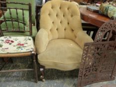 AN OATMEAL VELVET UPHOLSTERED MAHOGANY BUTTON BACKED ARMCHAIR ON WHITE CERAMIC CASTOR FEET