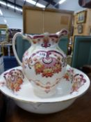 A VICTORIAN WASH JUG AND BOWLS.