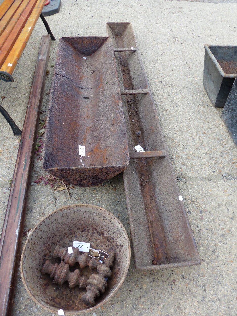 TWO CAST IRON TROUGHS, A CAULDRON AND THREE FINIALS