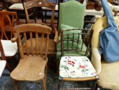 A RUSH SEATED ELBOW CHAIR, ANOTHER RUSH SEATED CHAIR, ANOTHER CHAIR IN GREEN UPHOLSTERY AND A