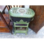 A PETROLUX GREEN AND BLACK ENAMELLED STOVE