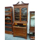 A SATIN WOOD BANDED MAHOGANY CYLINDER BUREAU DISPLAY CABINET, THREE LONG DRAWERS ABOVE THE BRACKET