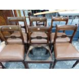 A SET OF SIX REGENCY MAHOGANY DINING CHAIRS, THE HORIZONTAL BAR BACKS CENTRED BY QUATREFOILS, THE