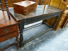 AN OAK REFECTORY TABLE WITH FLUTED APRON AND BALUSTER LEGS. W. 148 x D. 61 x H. 80.5cms